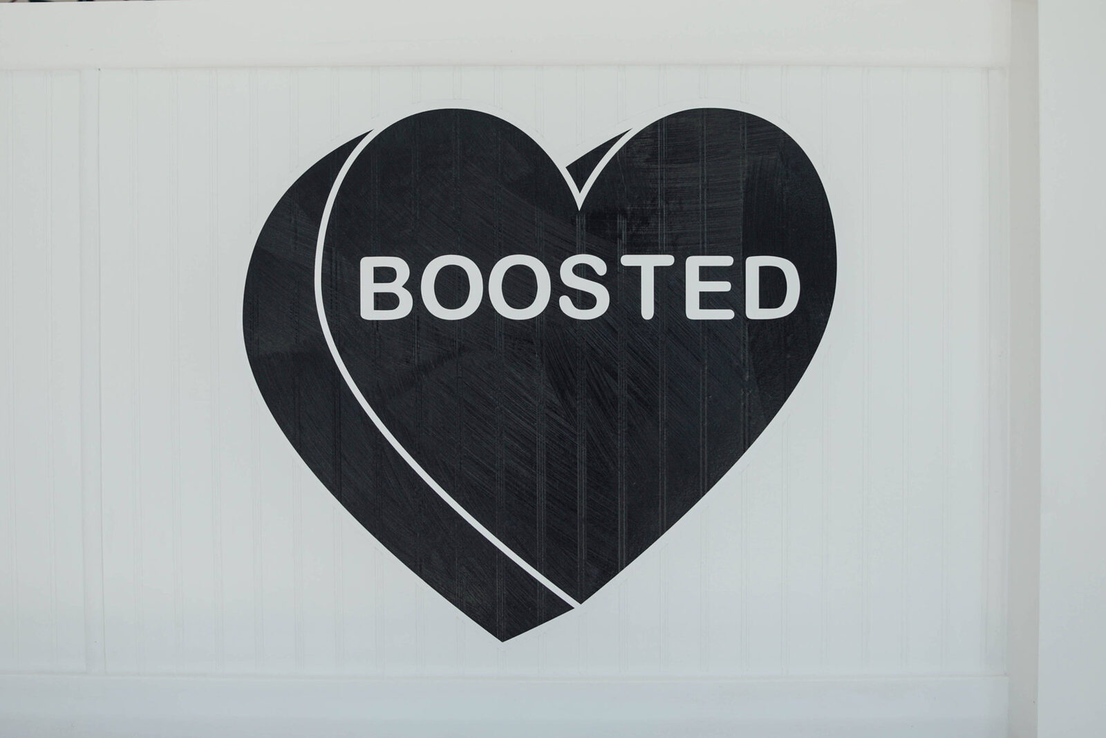 The BOOSTED heart on the wall inside the Manayunk shop